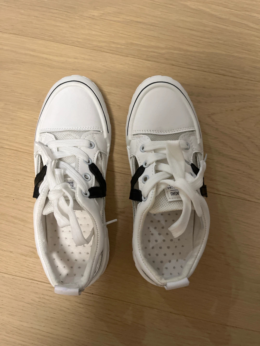 White sneakers with black details🏈
