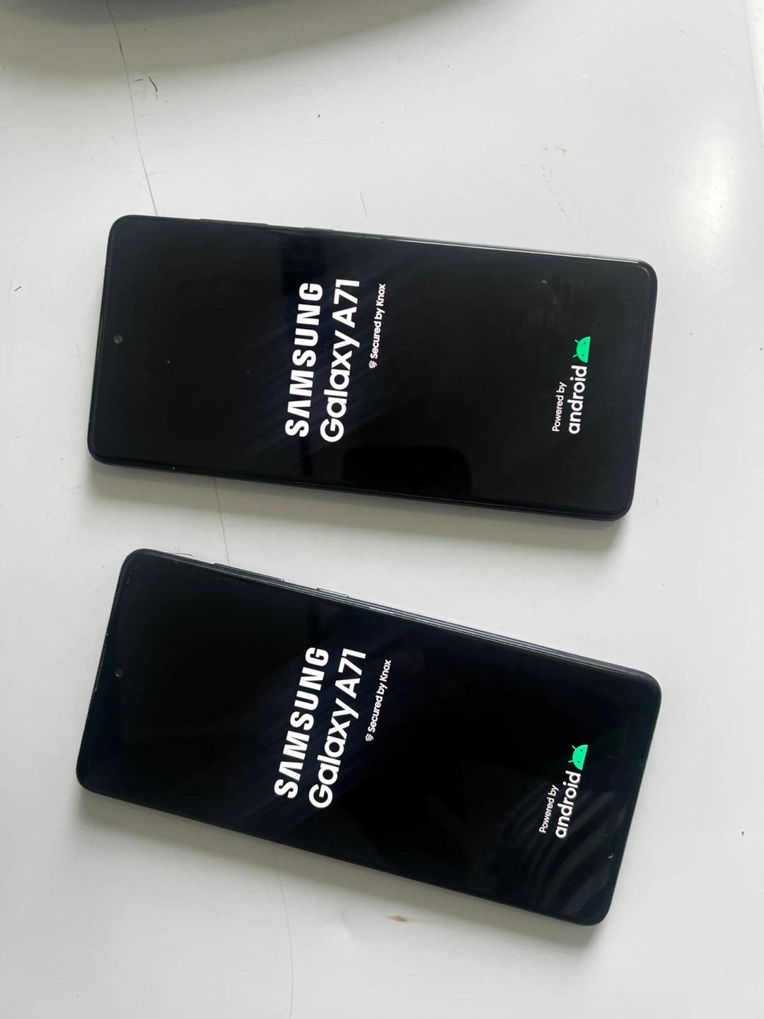 Two Samsung Galaxy A71 smartphones