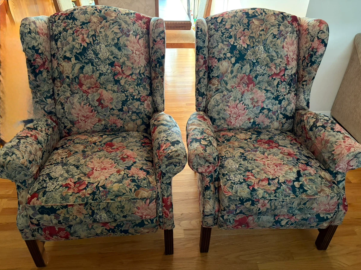 Set of two floral wingback recliners