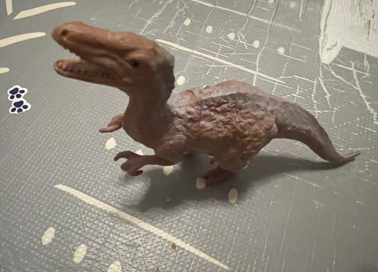 Brown Dinosaur Toy Figure 🏈