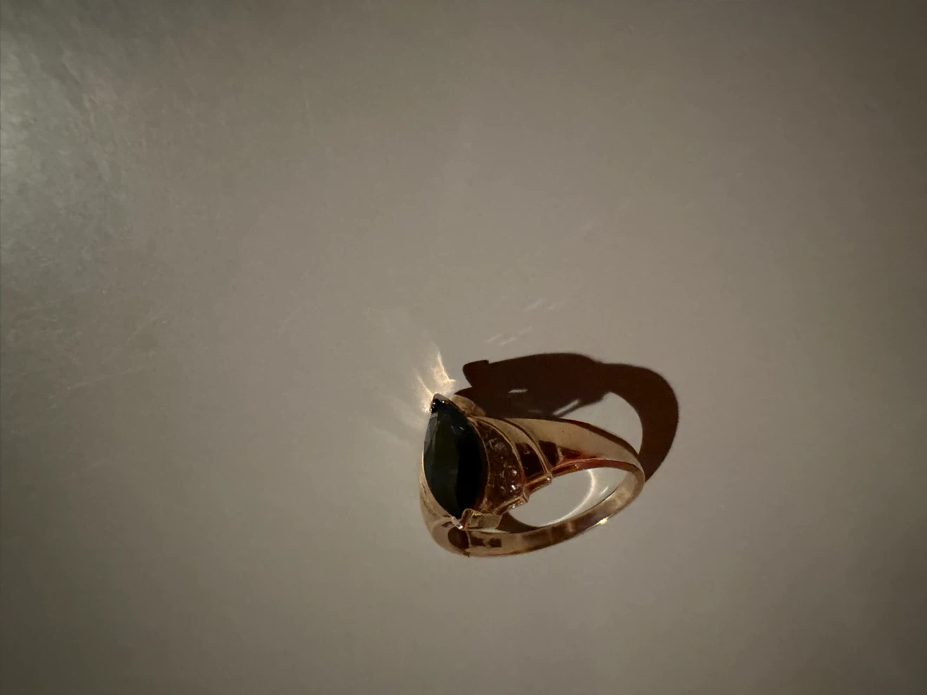 Gold ring with pear-cut dark stone - photo 2