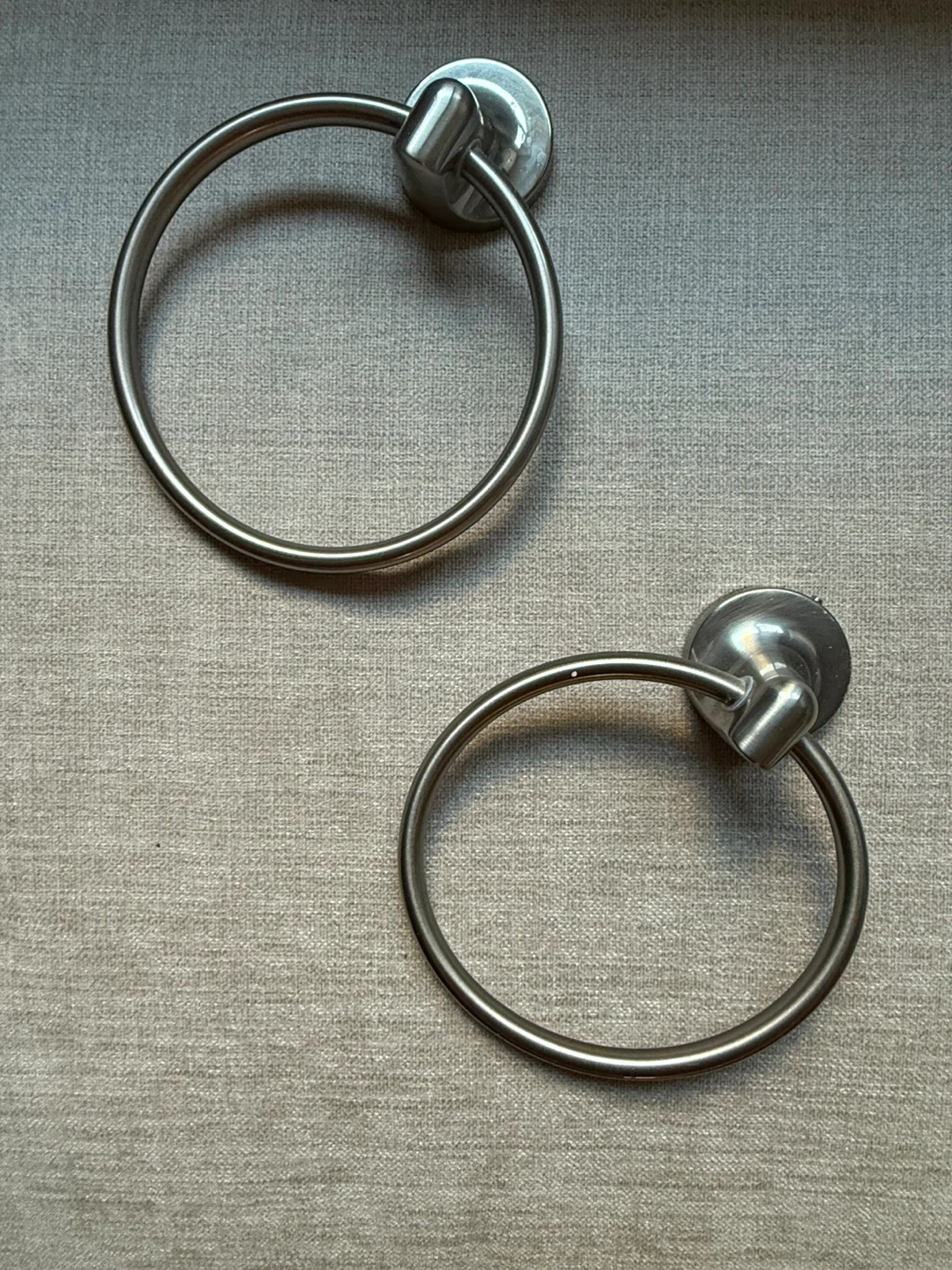 Brushed nickel bathroom hardware fixtures