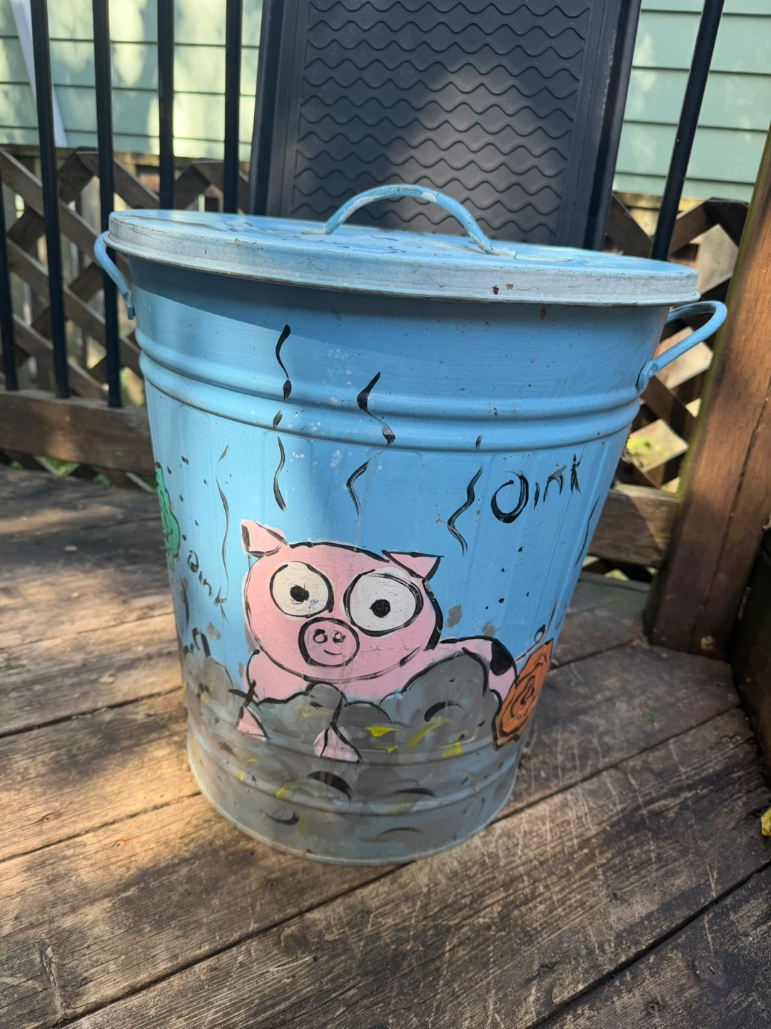 Hand-painted pig motif metal bin