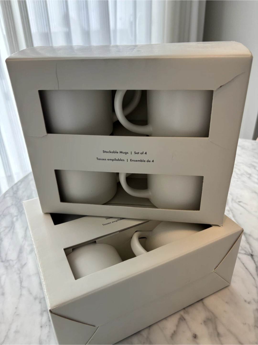 Brand New Indigo Set of 4 White Stackable Mugs