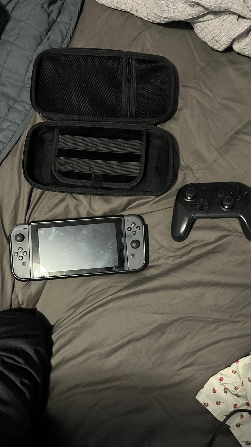 Nintendo Switch Console with Pro Controller and Case