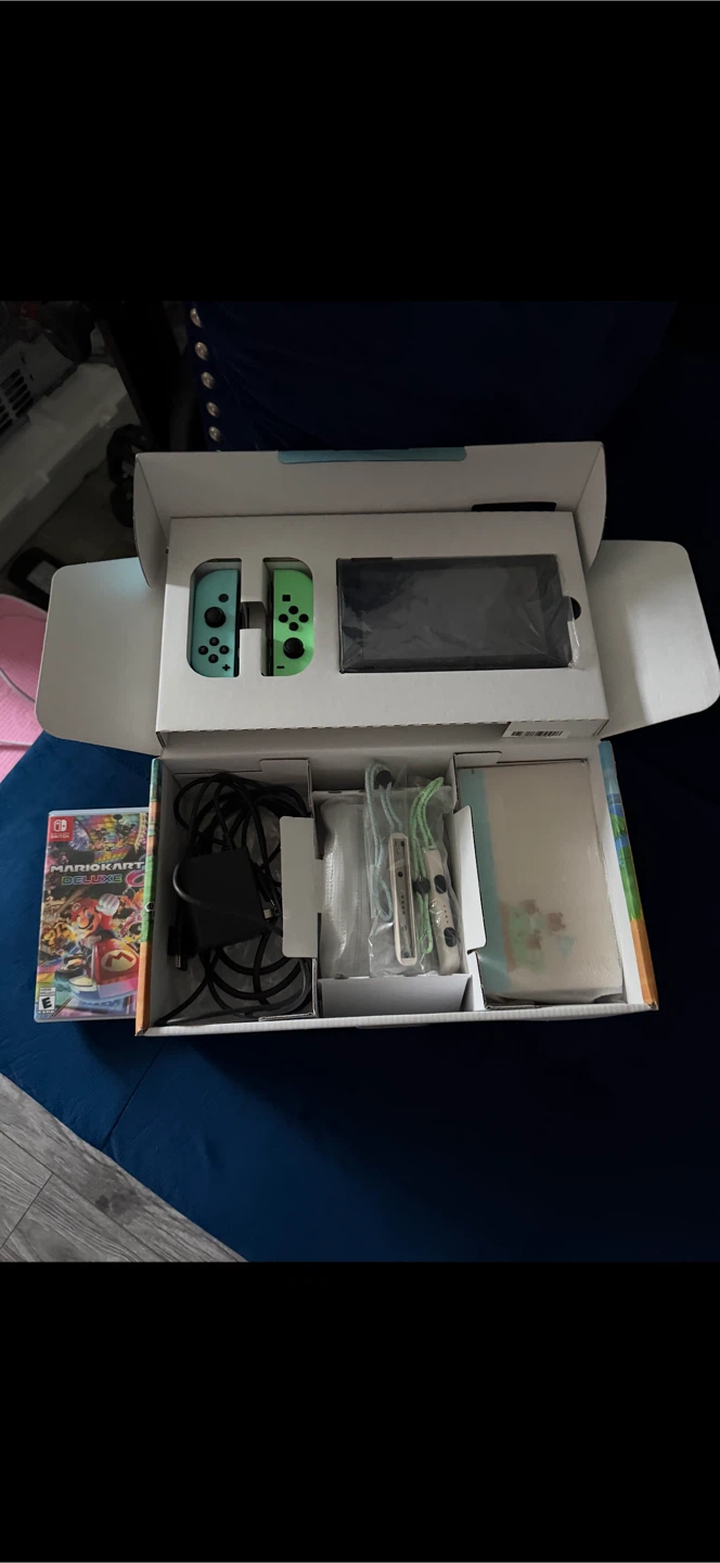 Nintendo Switch - Animal Crossing: New Horizons Edition - photo 2