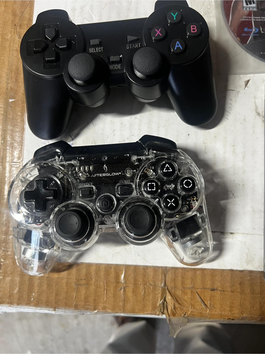 2 PS3Gaming Controllers and one game