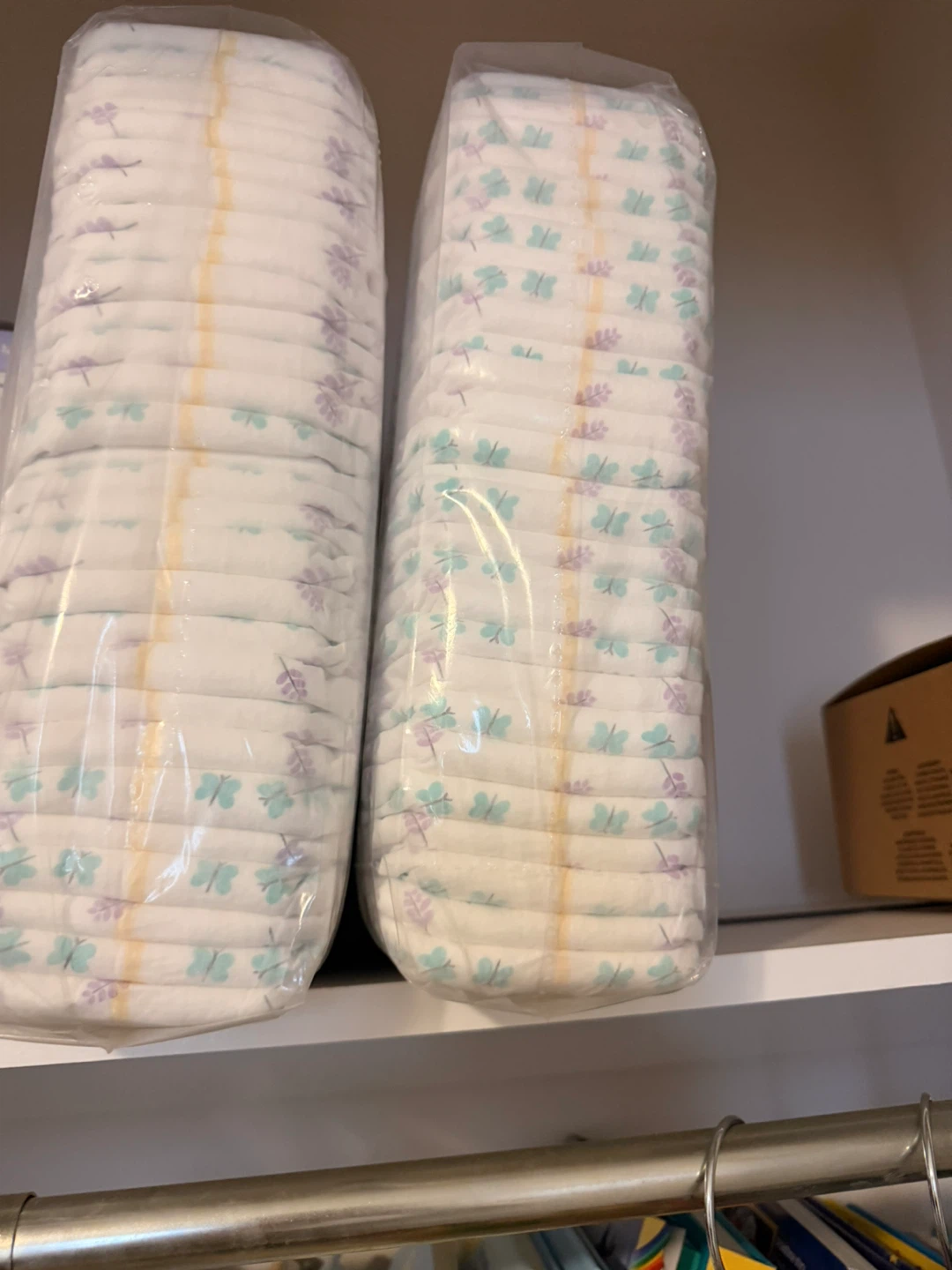 128 size 2unopened packs of diapers