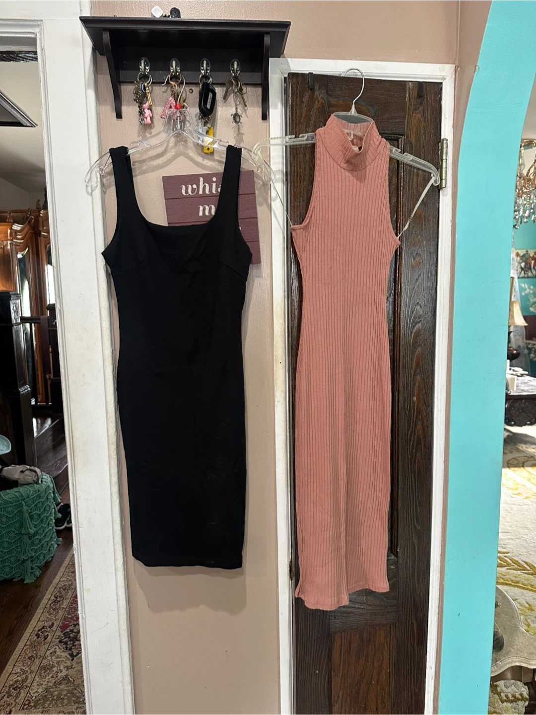 Black Sleeveless Dress and Mauve Ribbed High-Neck Dress