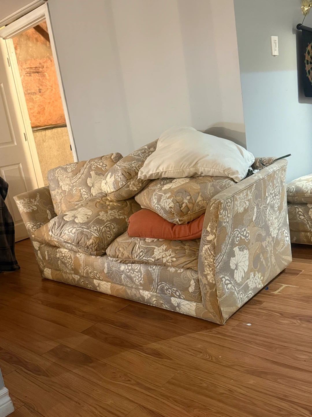 Floral pattern loveseat and couch with foot rest