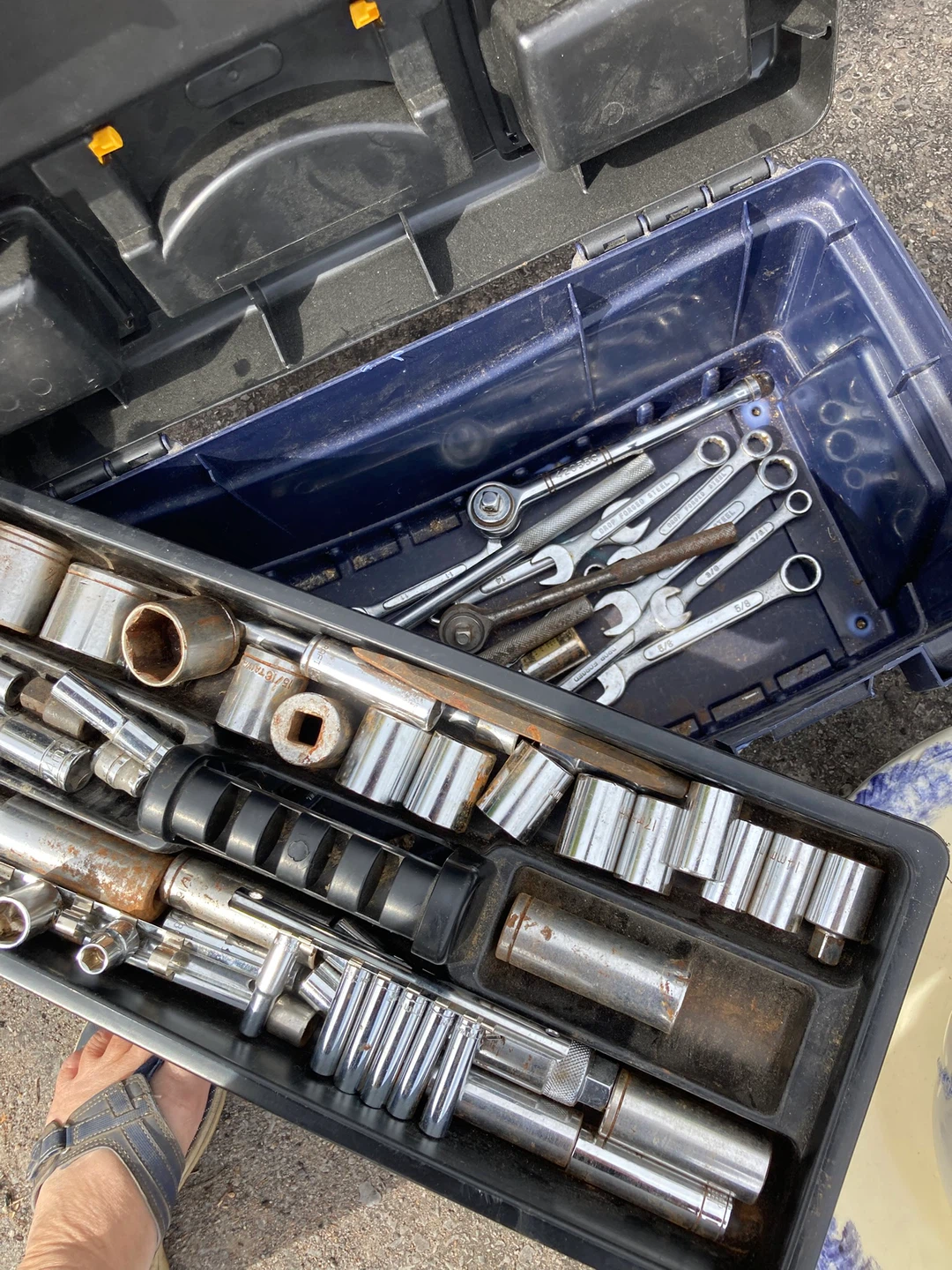 Assorted sockets and wrenches in tool box