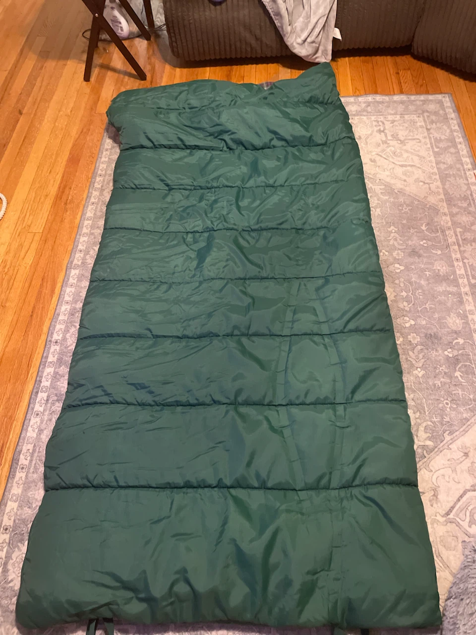 Green Sleeping Bag with Plaid Interior