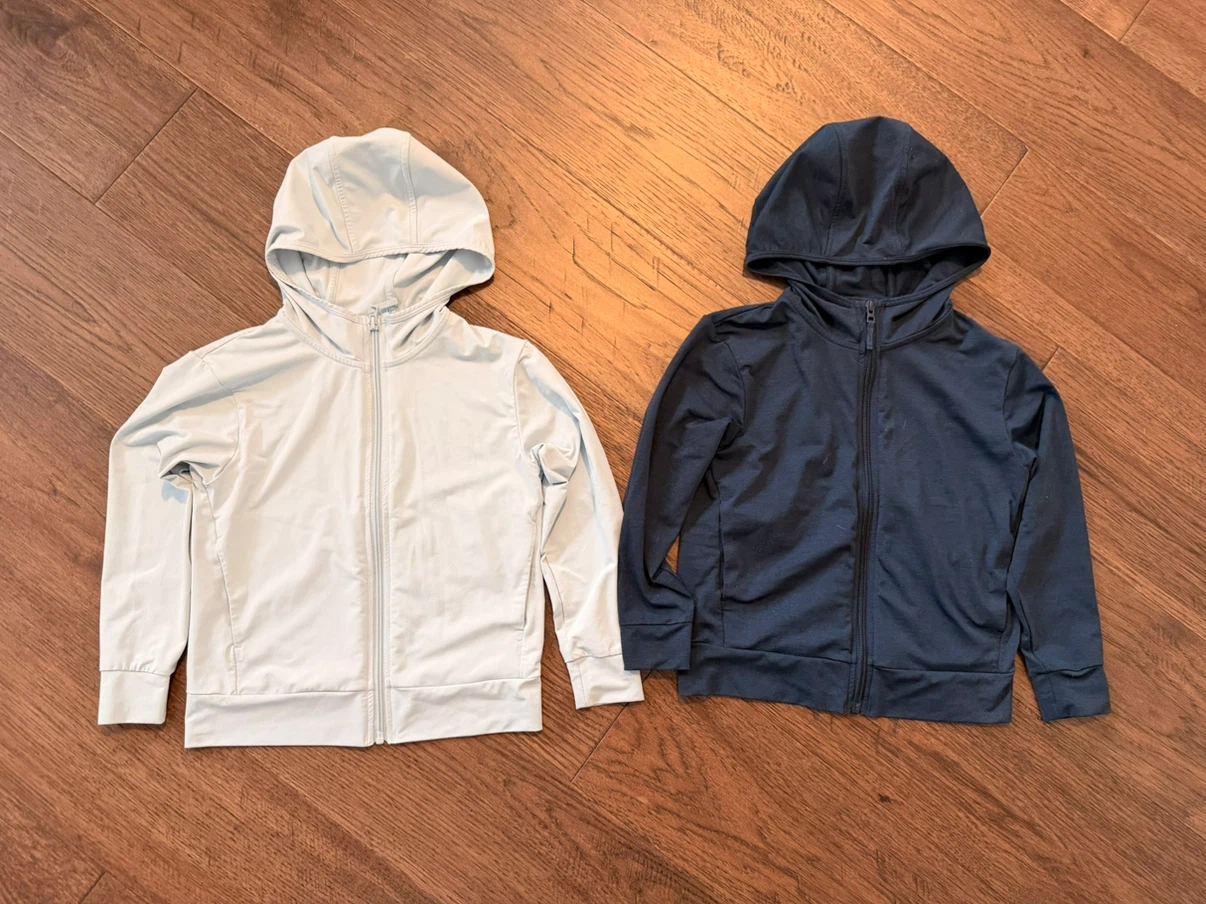 Two Uniqlo Kids UV Protection Zip-Up Hoodies