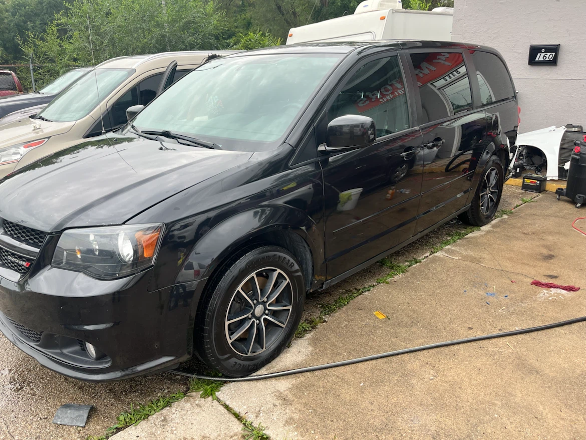 Black Dodge Grand Caravan Minivan