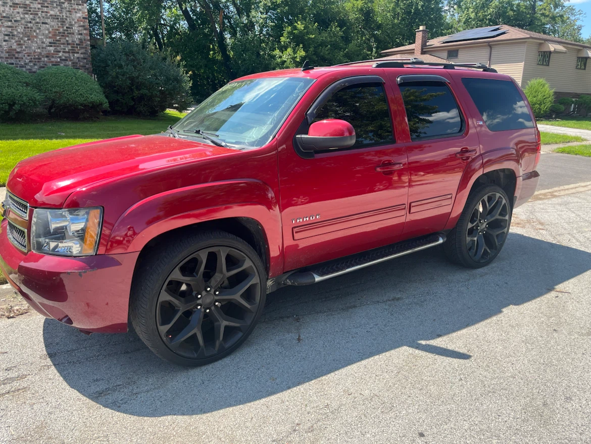 Red Chevrolet Tahoe SUV