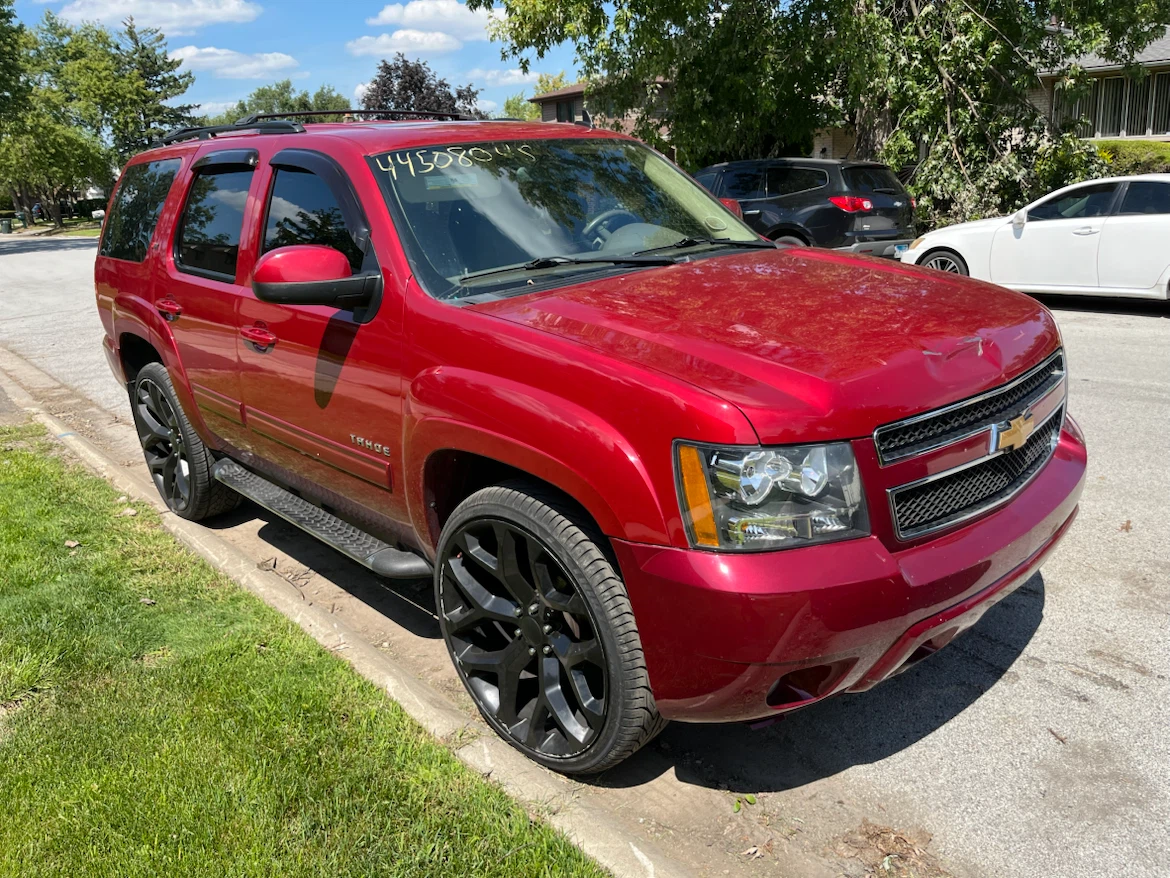 Red Chevrolet Tahoe SUV - photo 2