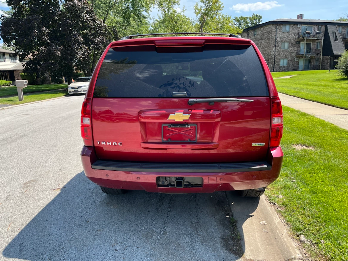 Red Chevrolet Tahoe SUV - photo 5