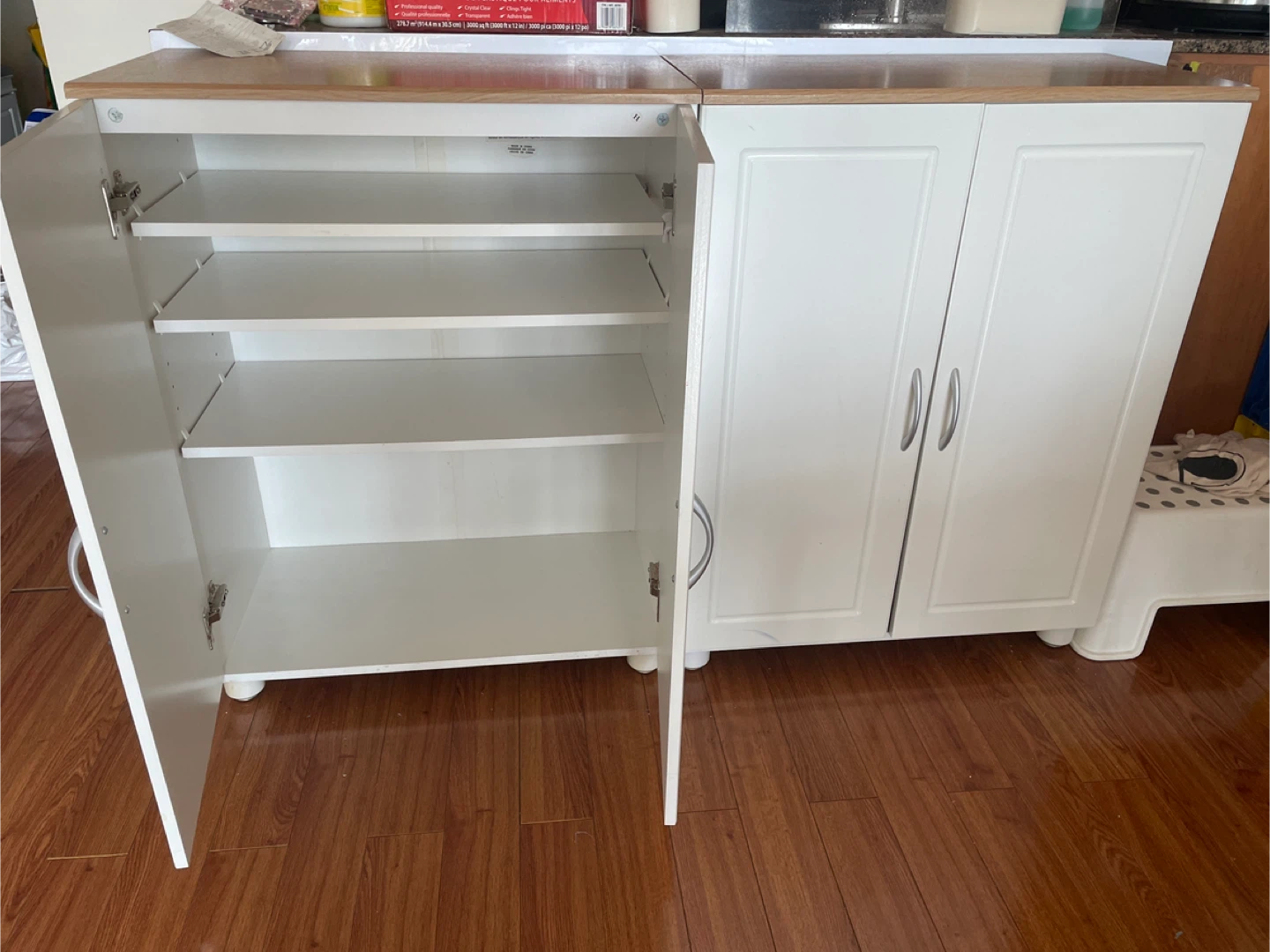 2 White Wood Cabinets with Wooden Top