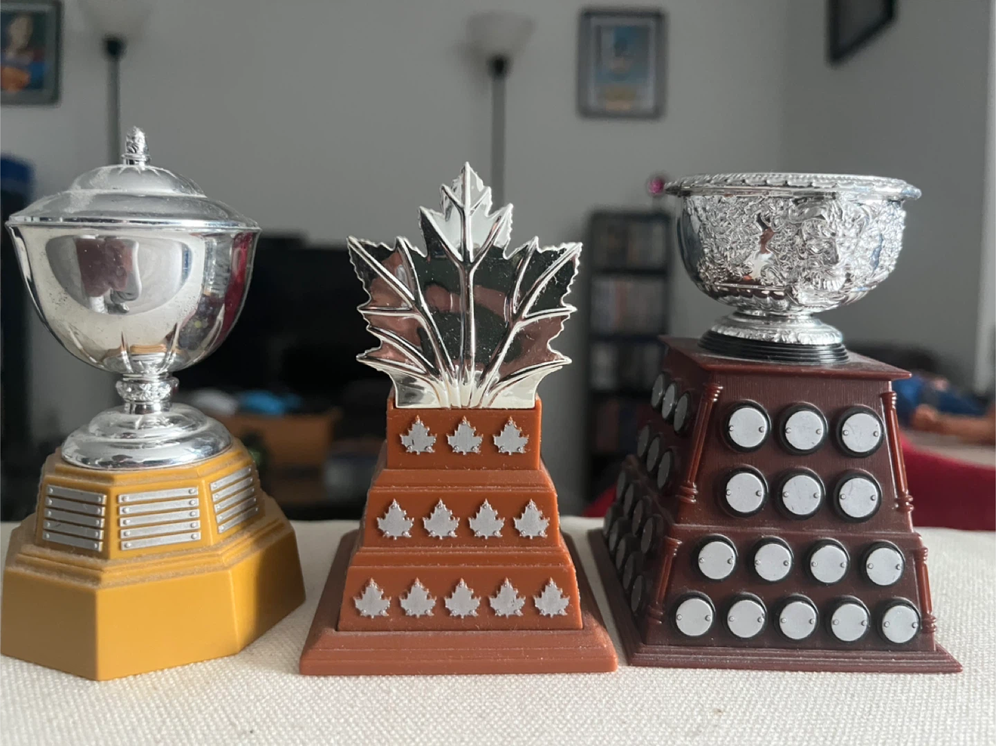 Set of three mini Canadian trophy replicas
