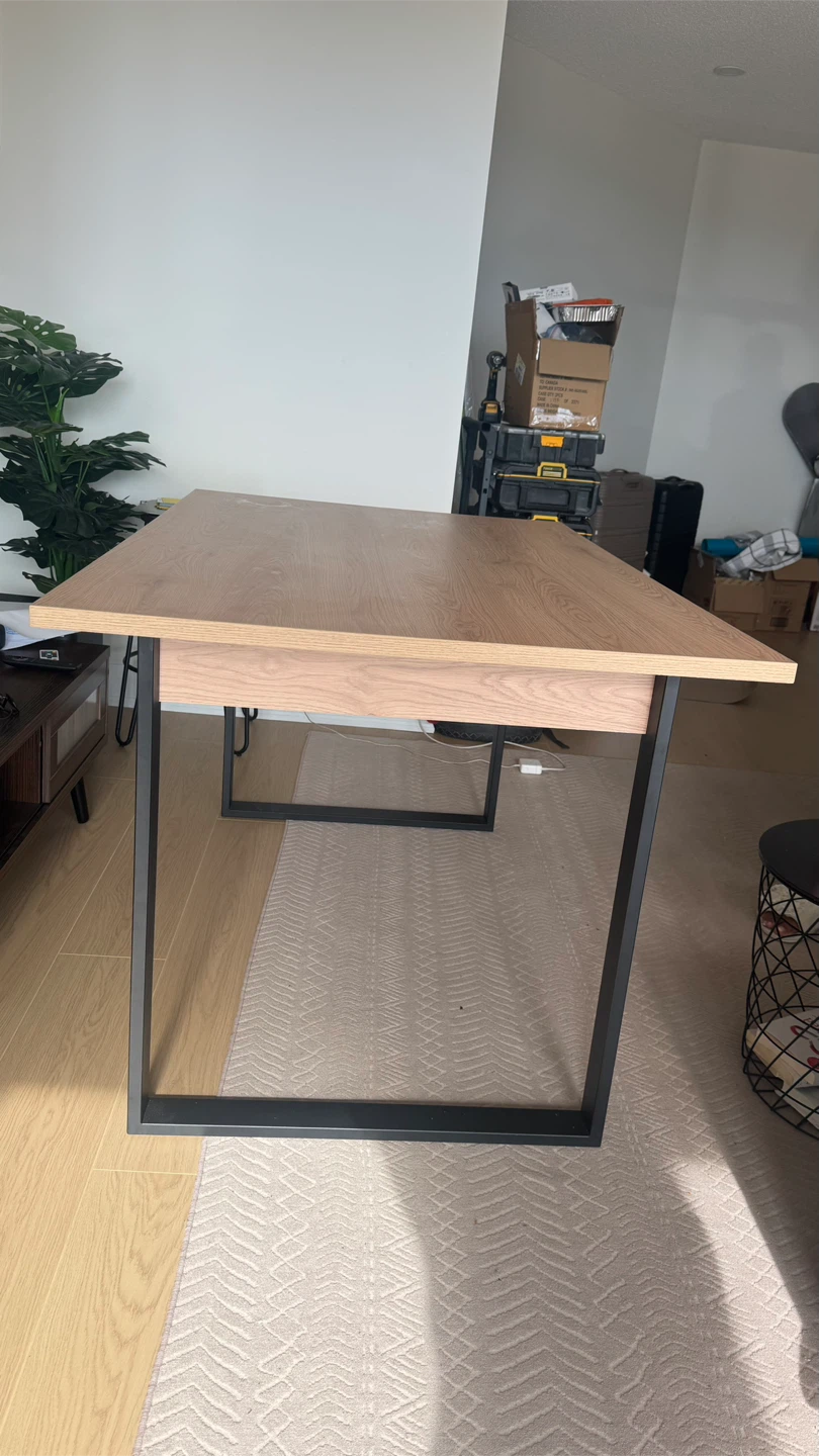 Modern wood grain table with black metal legs