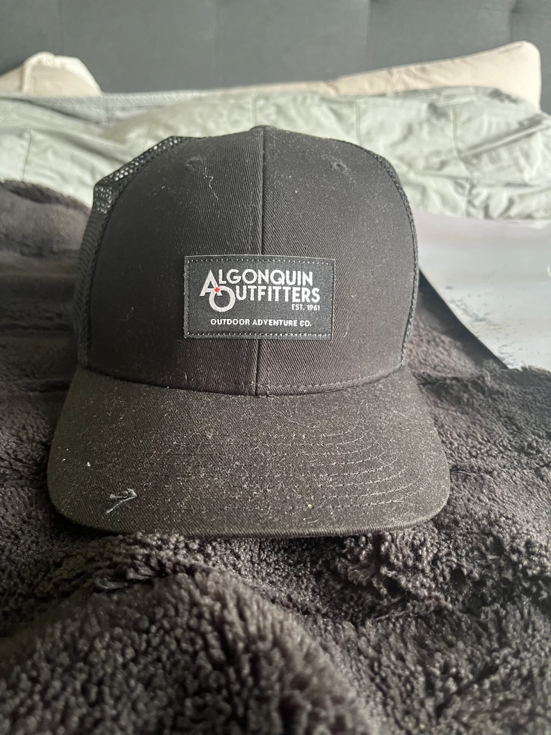 Algonquin Outfitters Black Mesh Trucker Hat
