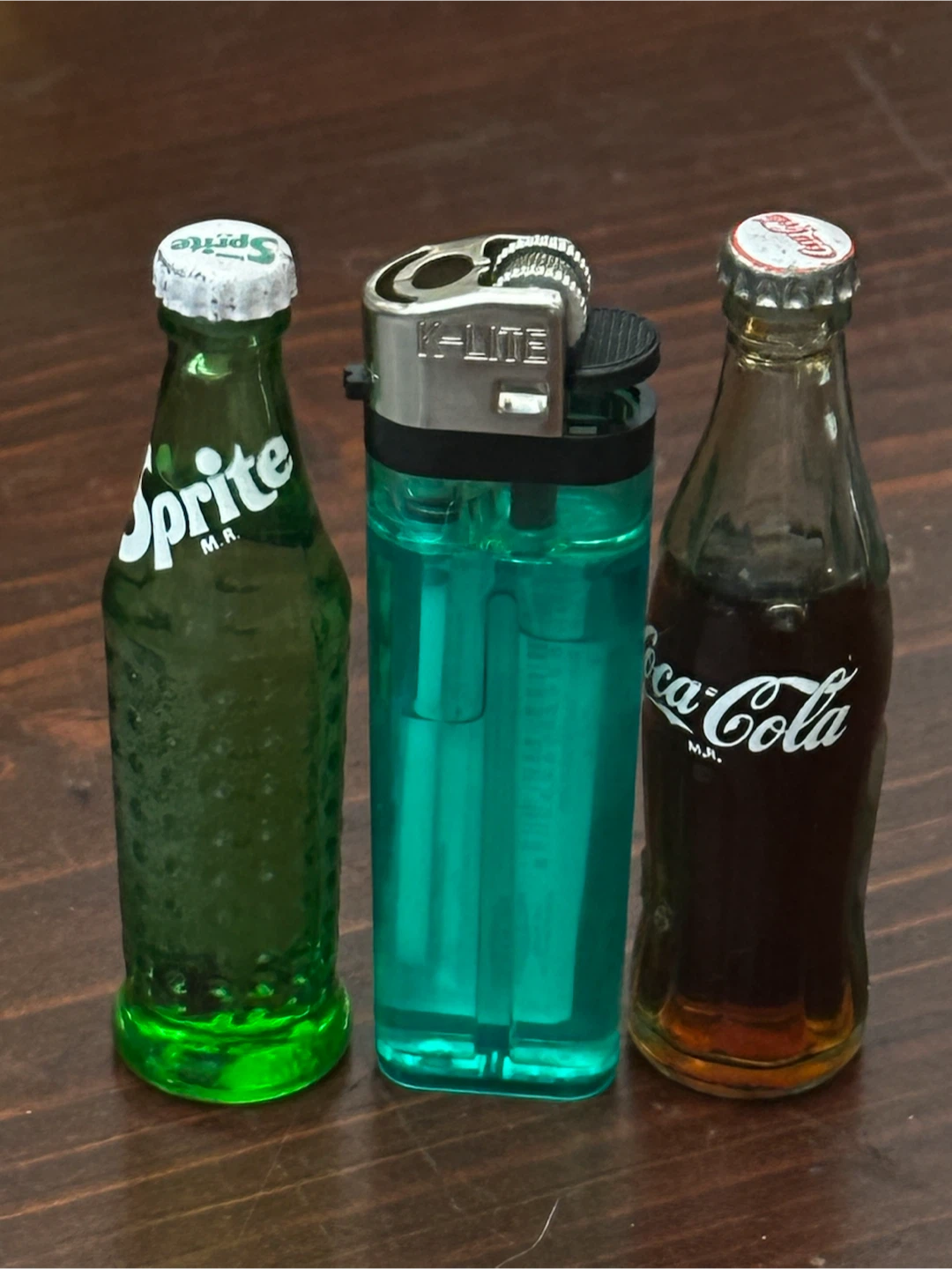 Vintage miniature sprite and coke pop bottles