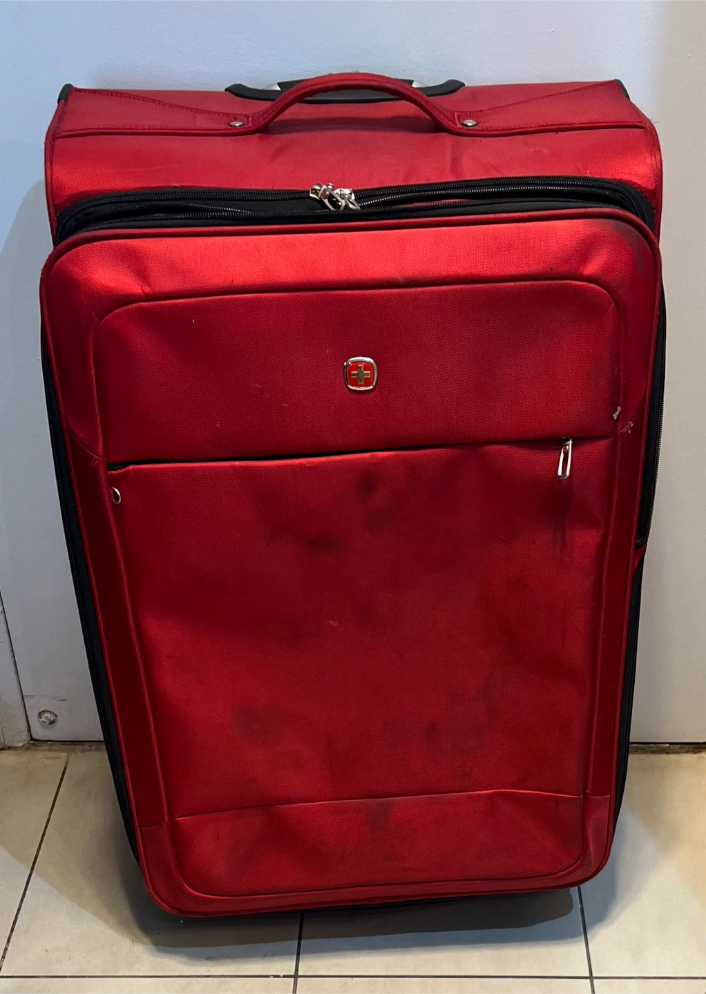 SwissGear Red Spinner Suitcase