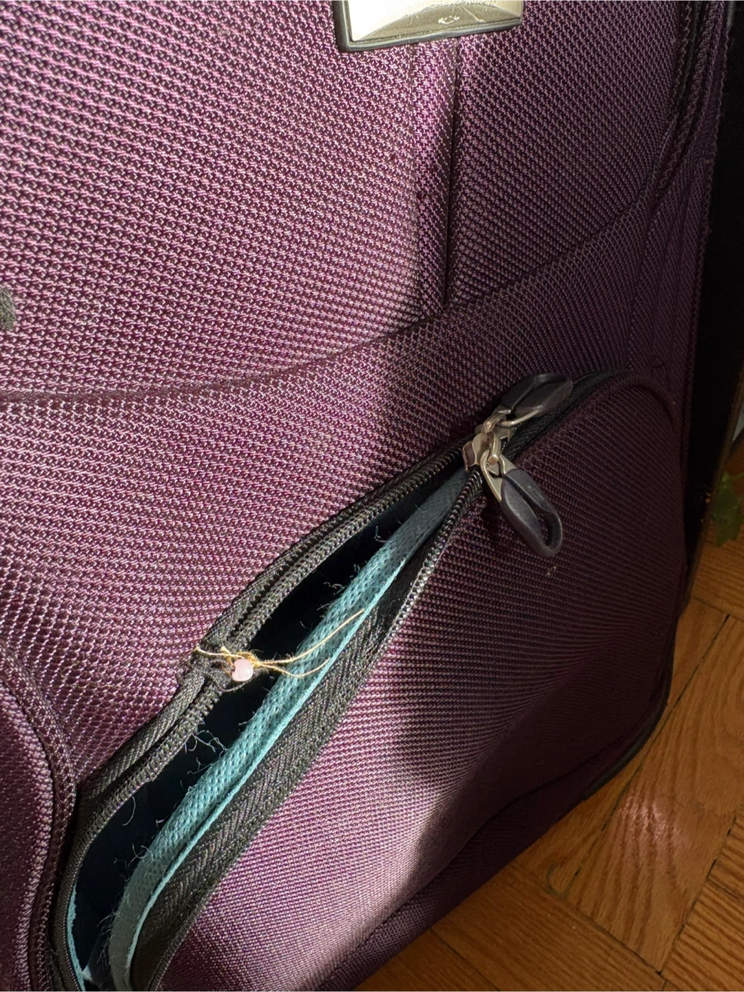 VIA Rail Canada purple rolling suitcase - photo 2