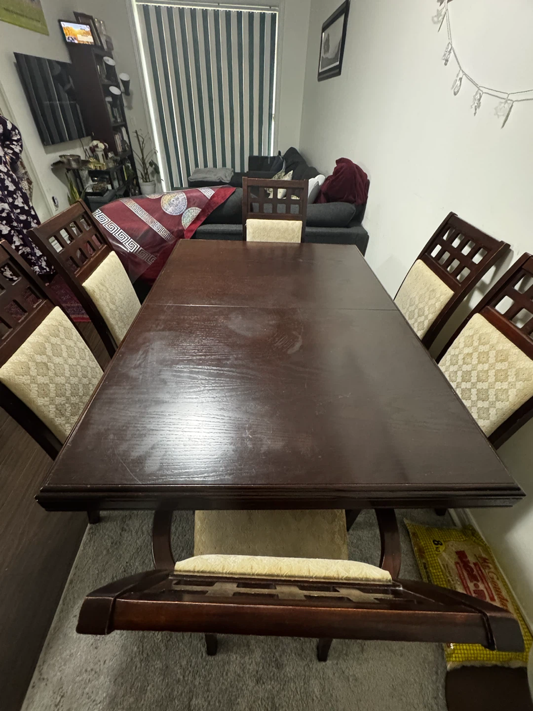 6 dark wood dining chairs with cream upholstery with table