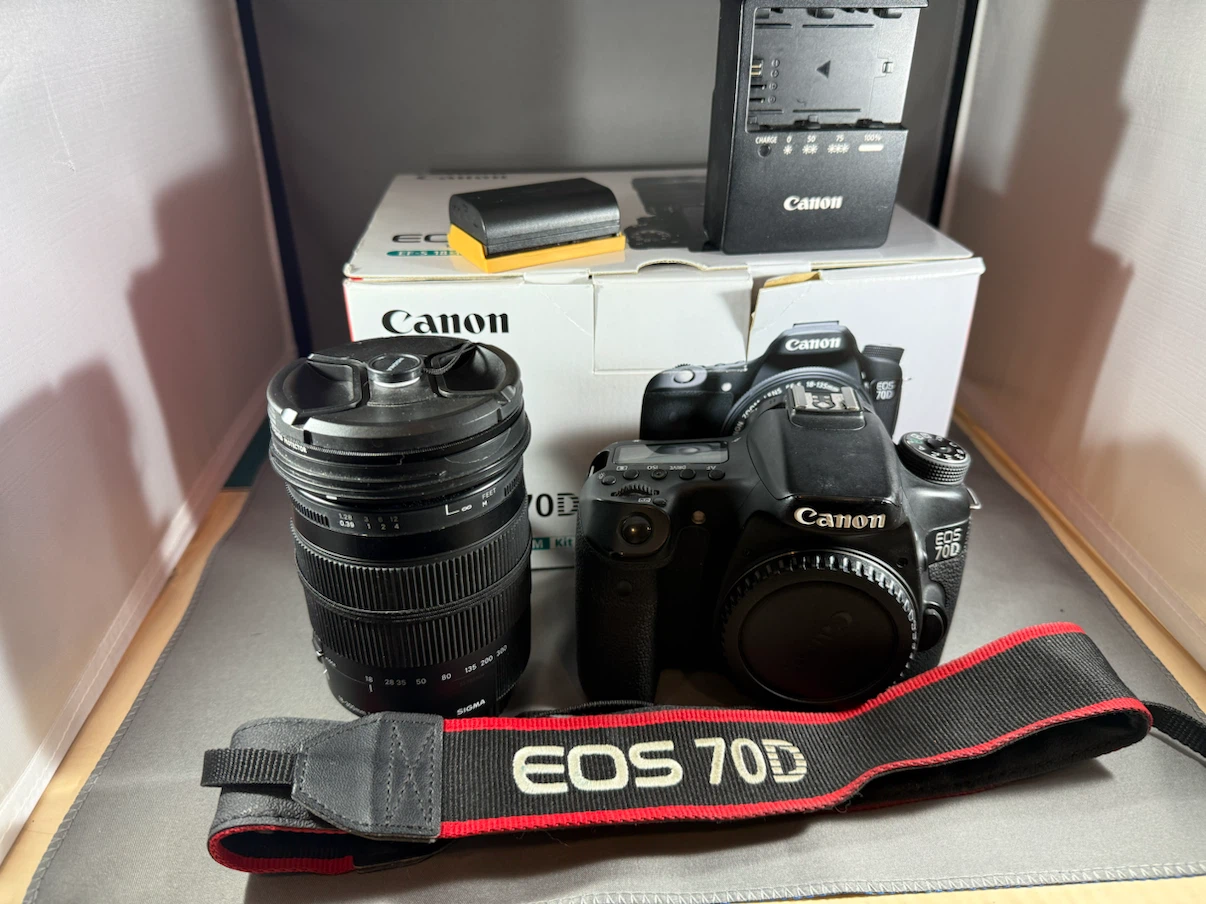 This Canon EOS 70D comes with a Sigma 18-300.