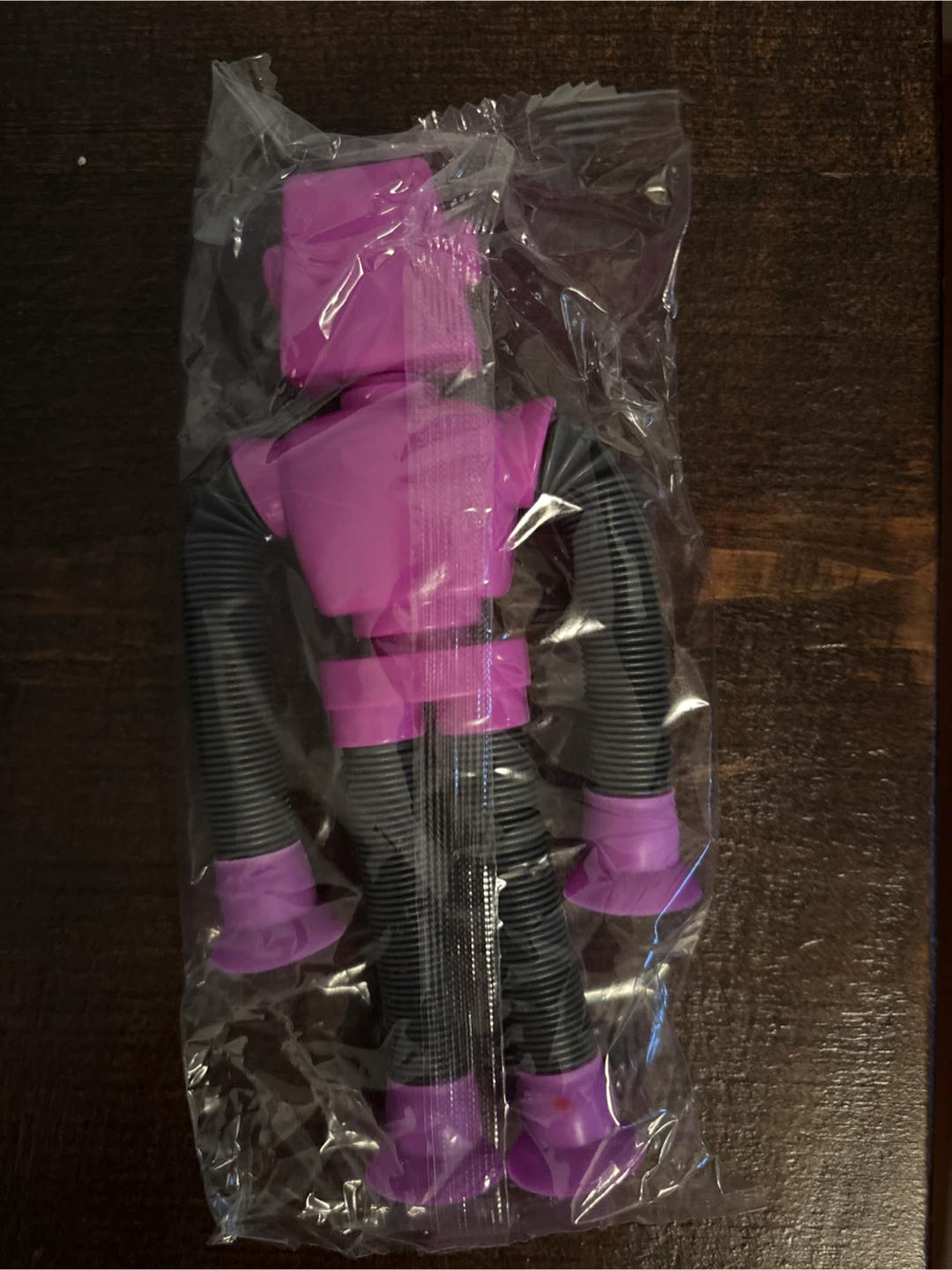 🏈 Purple Robot Pop Tube Fidget Toy - photo 2
