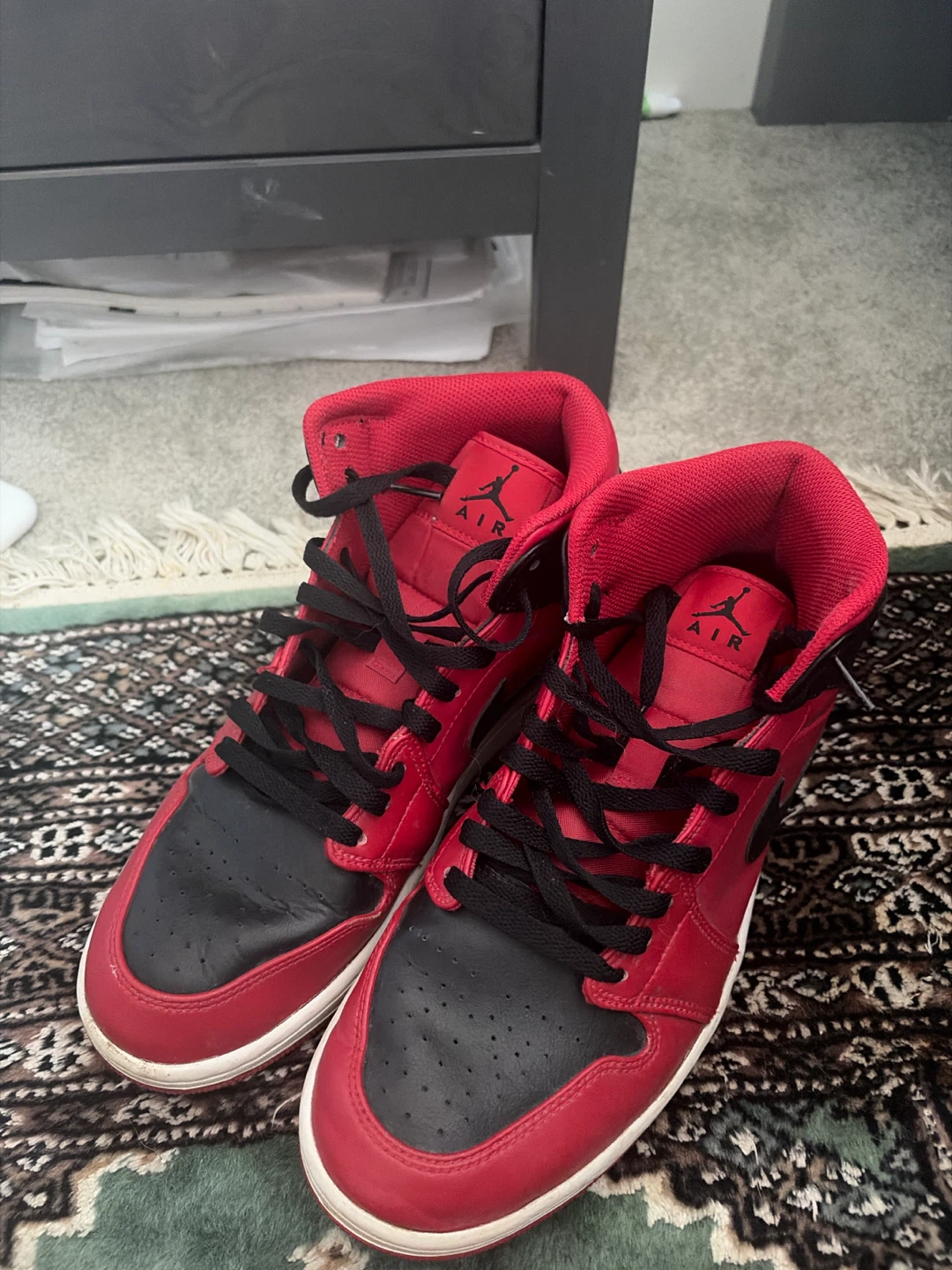 Air Jordan 1 Mid Red and Black Sneakers