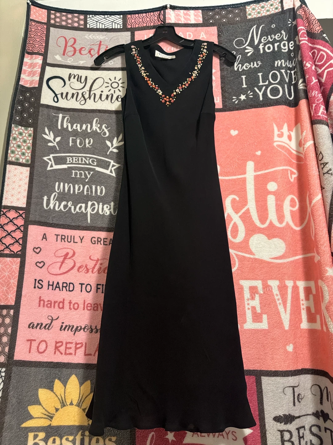 Black Sleeveless Dress with Embellished Neckline