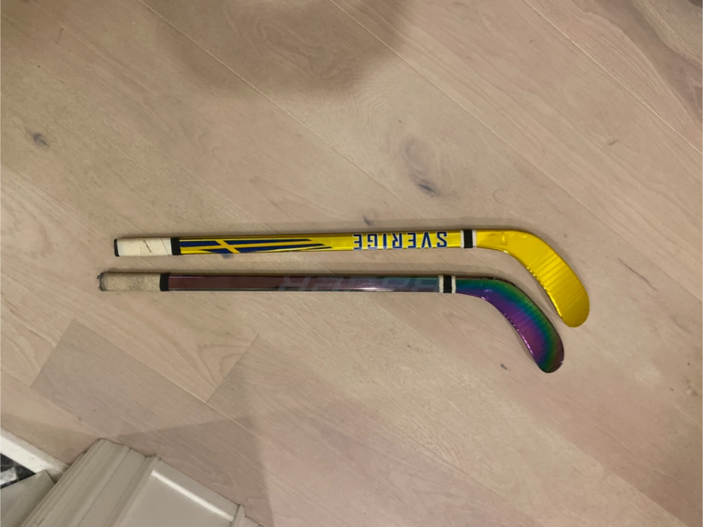Two mystery  Mini Hockey Sticks