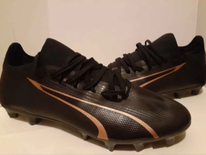 Puma Black and Gold Soccer Cleats