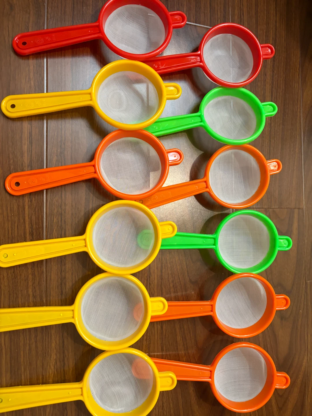 12 plastic tea strainers for $10