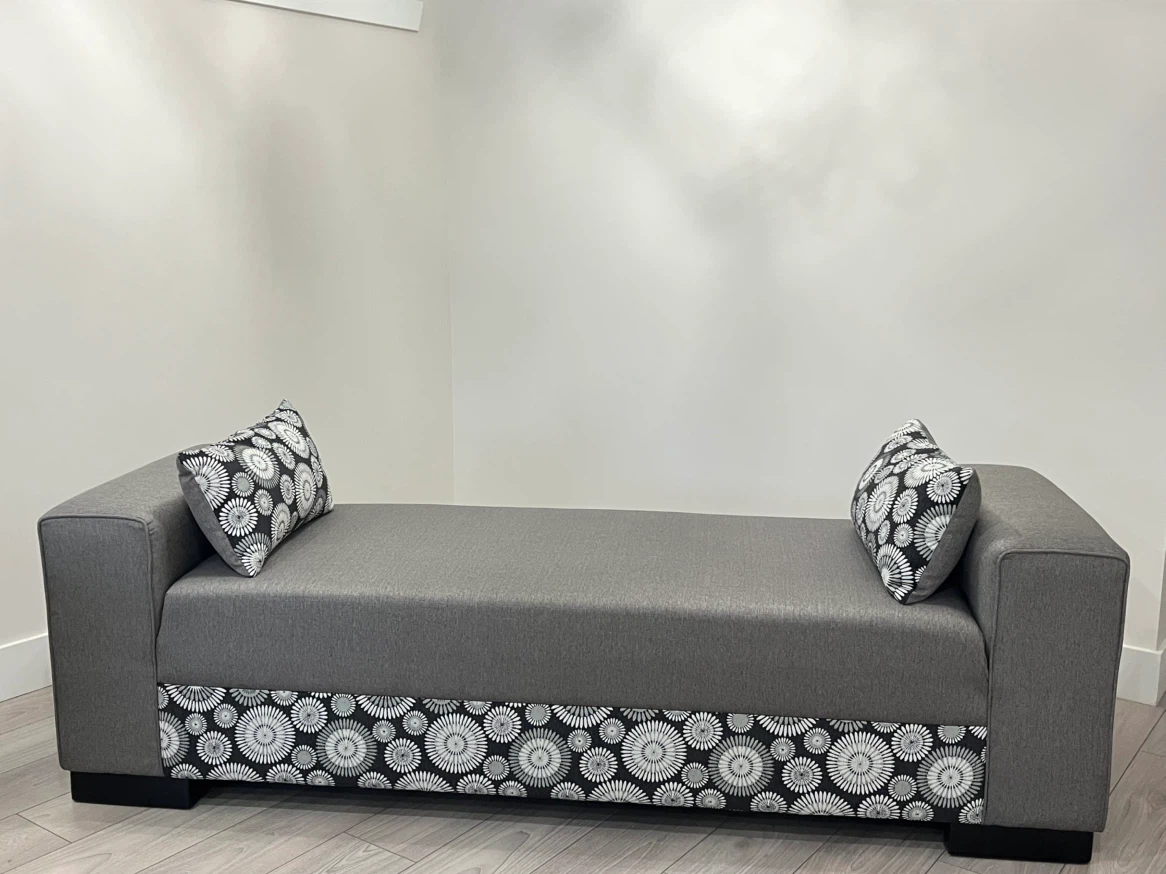 Grey Fabric Daybed with Patterned Accents 🏈