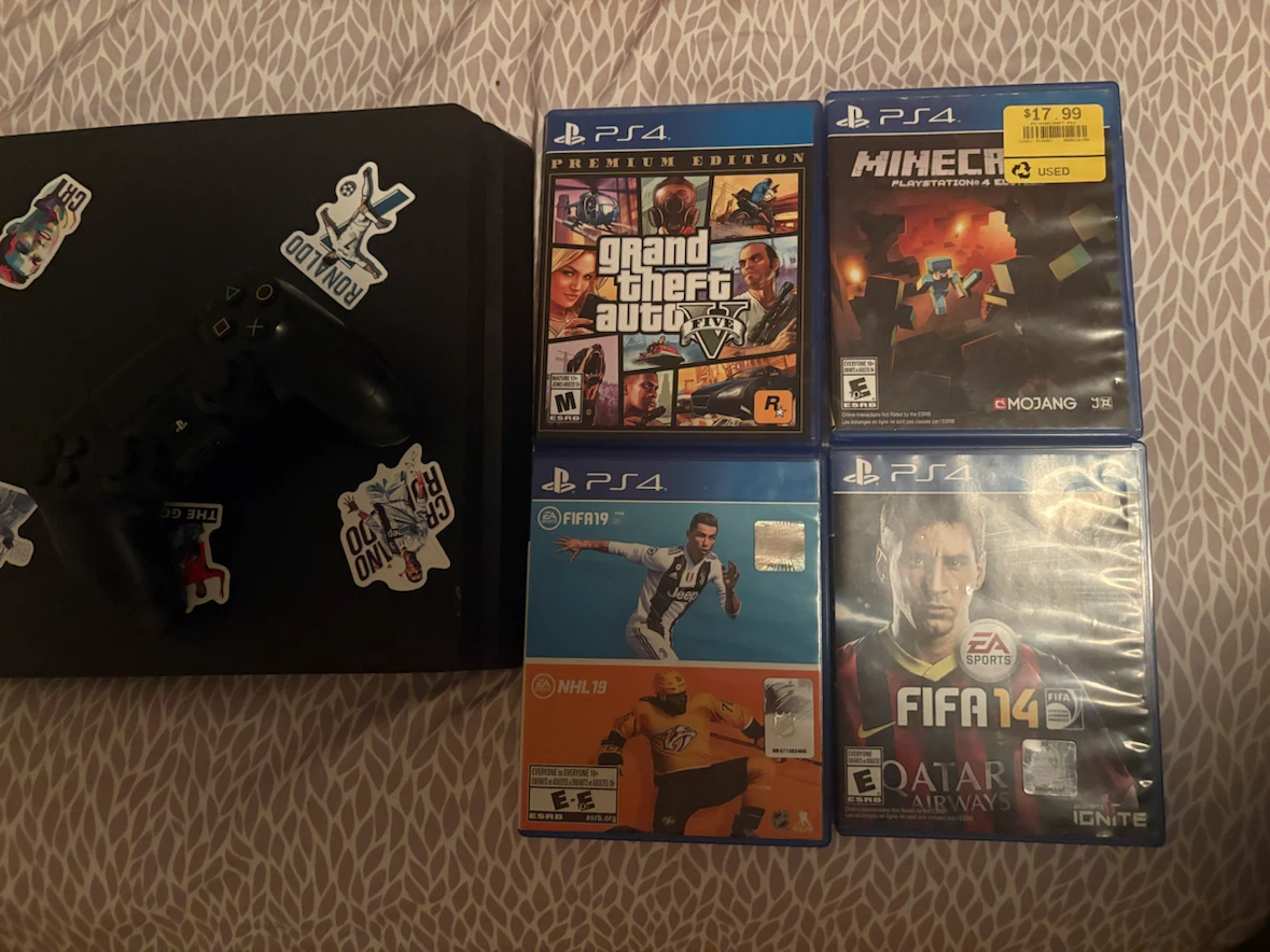 PlayStation 4 slim with 4 Games and Controller