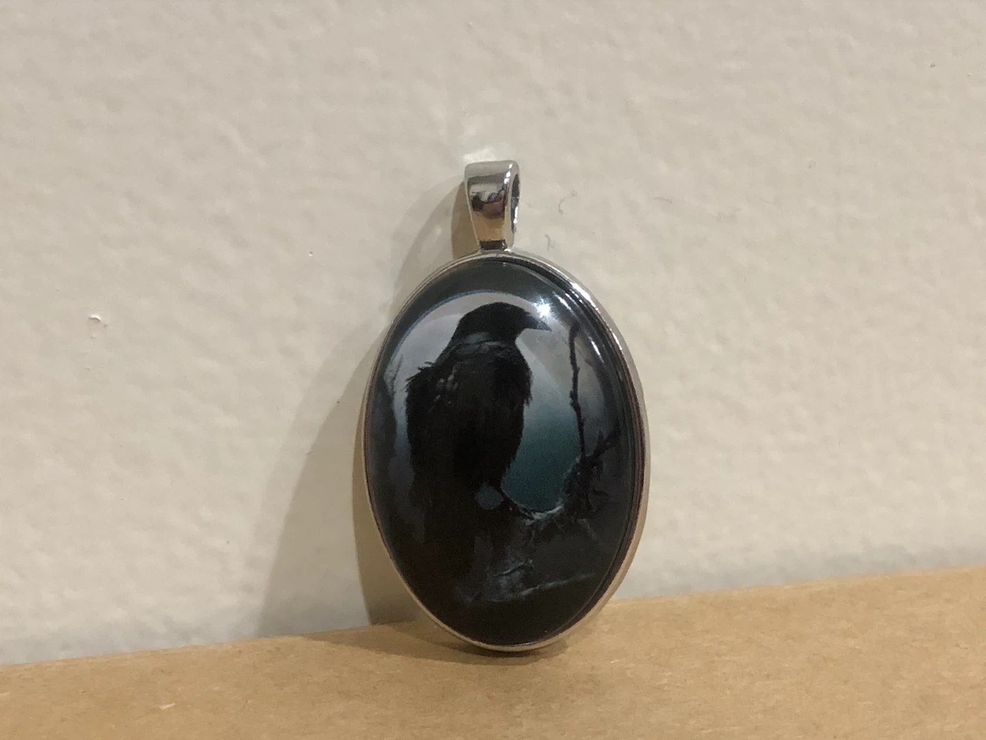 Oval Raven Pendant 🏈