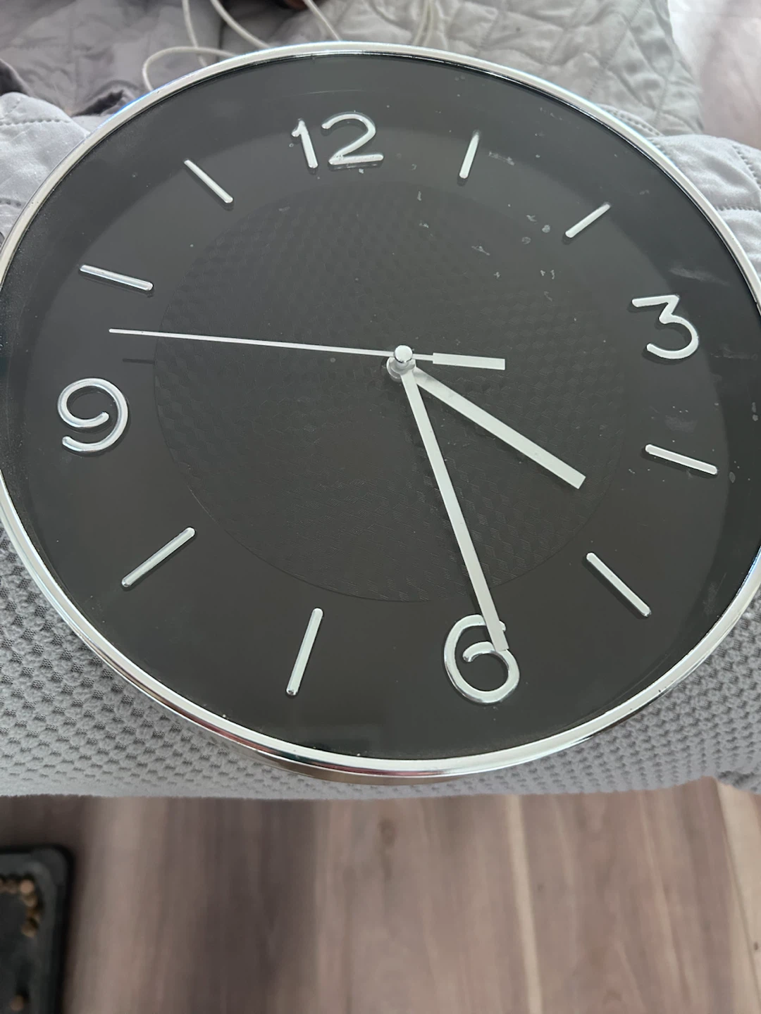 🏈  Black and Silver Round Wall Clock
