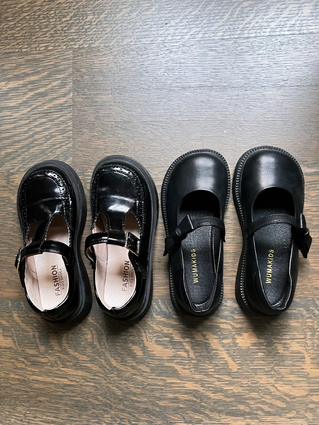 Two pairs of kids black dress shoes