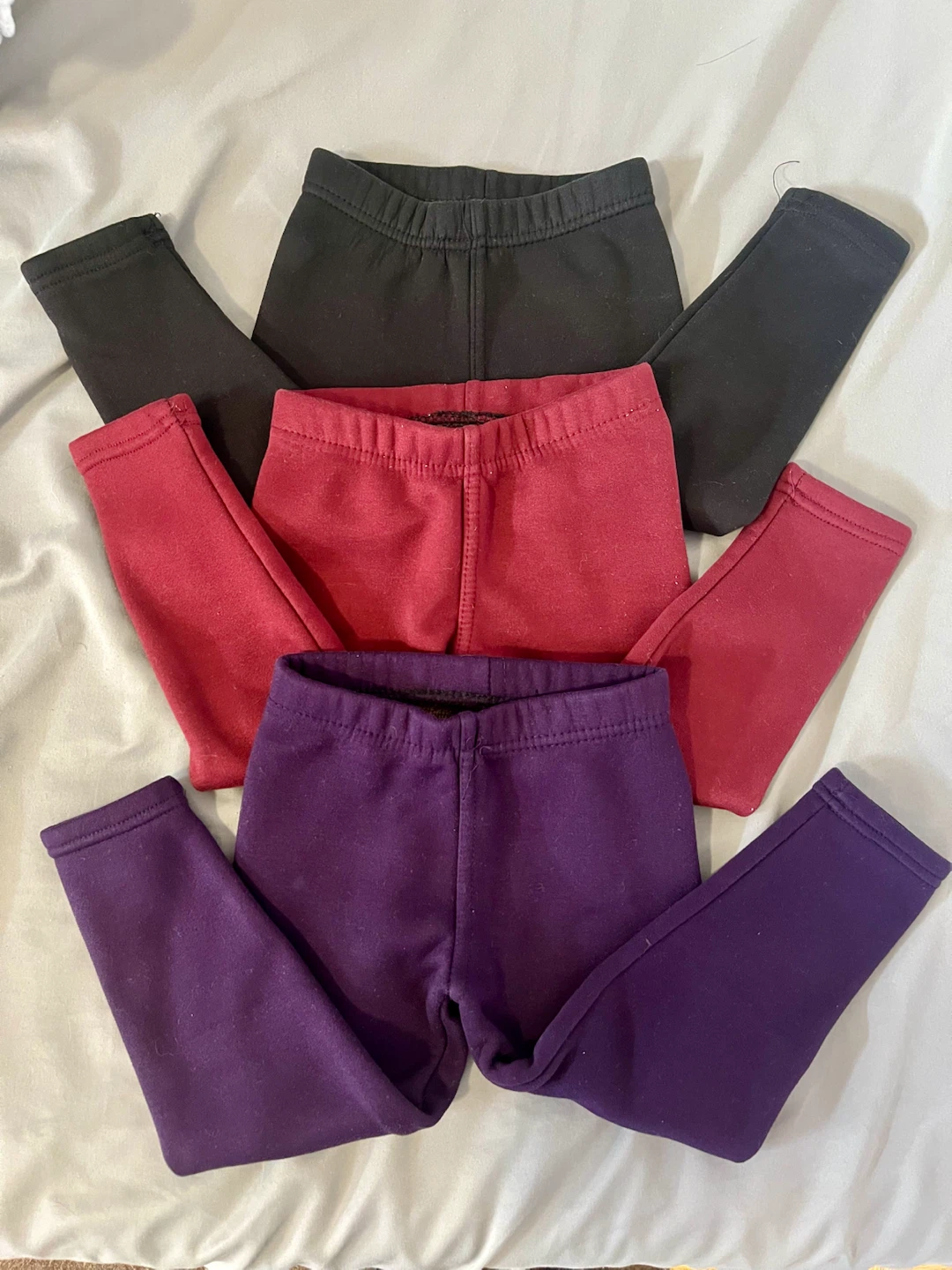 Three pairs of fleece leggings
