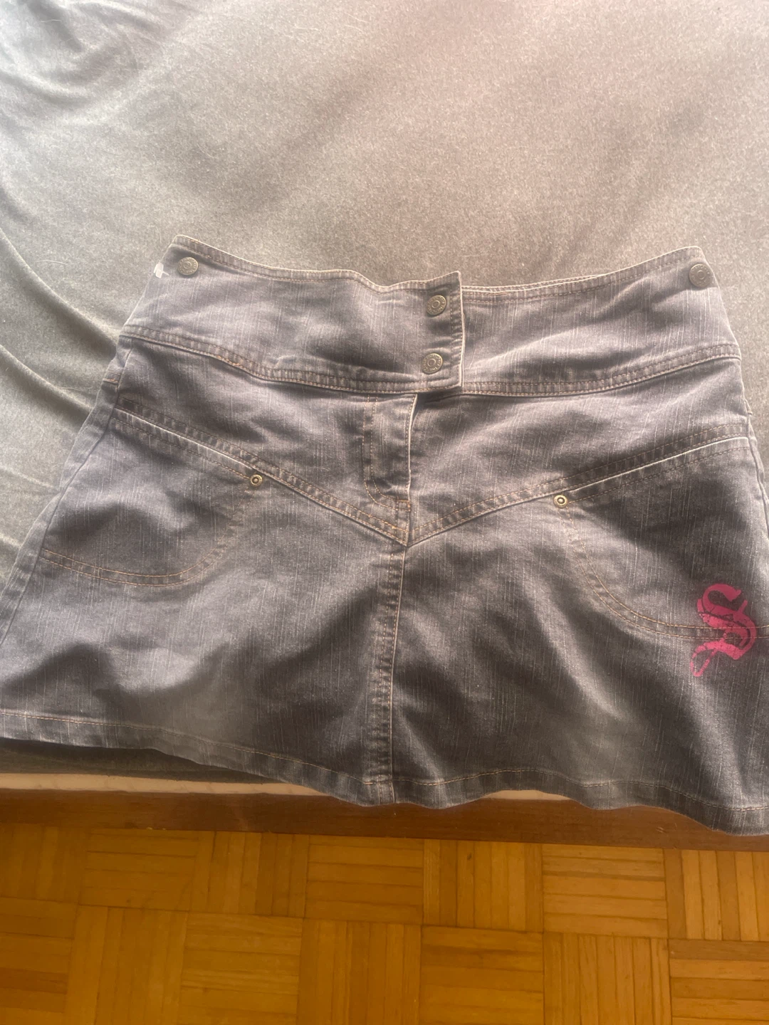 Dark wash denim mini skirt