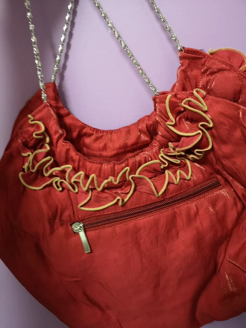 Red hobo handbag with floral details