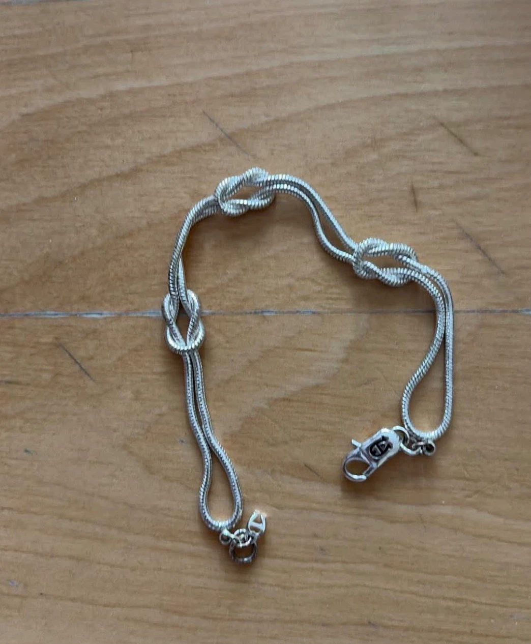🏈Aigner Silver Tone Knot Bracelet
