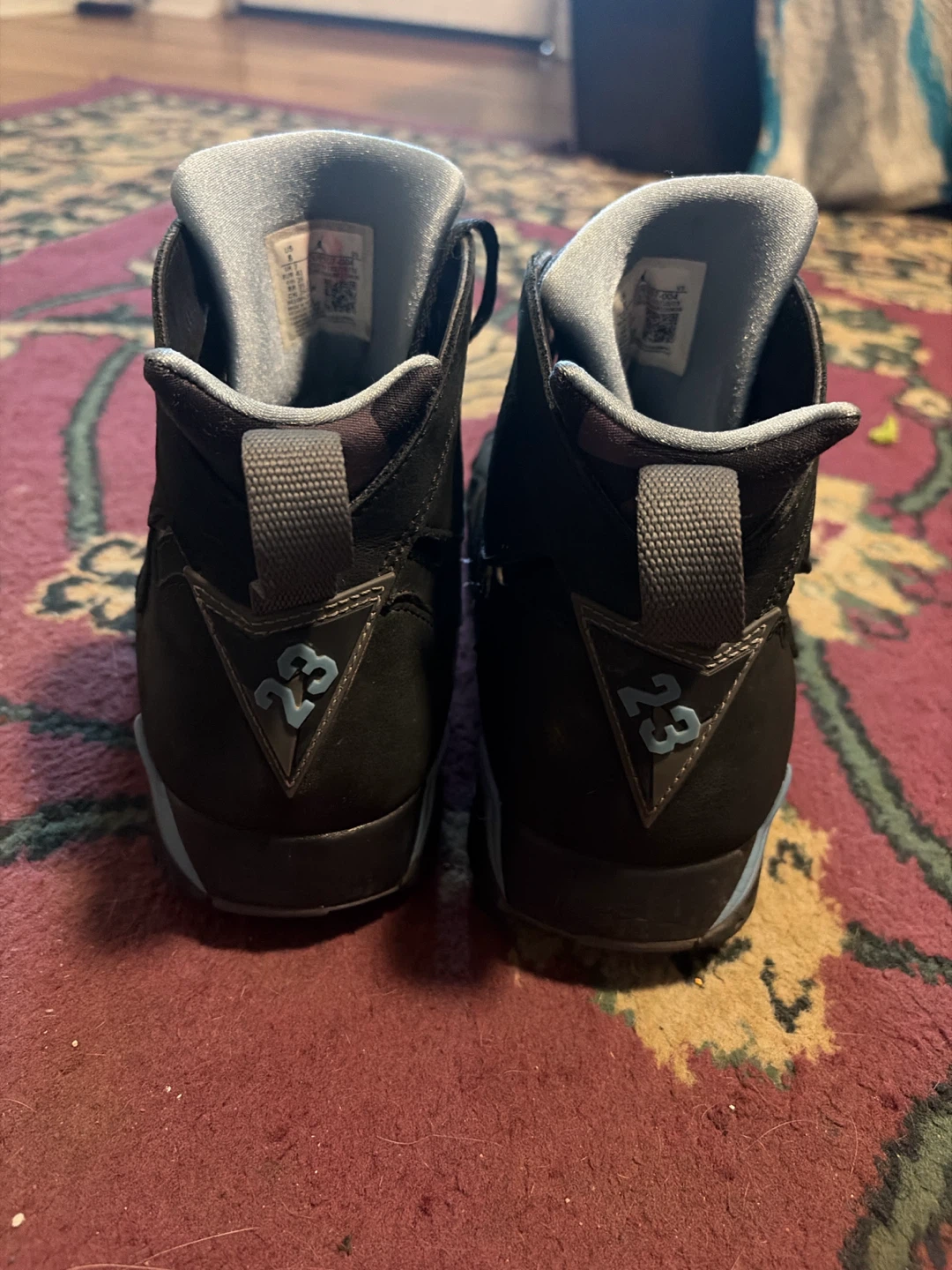 Jordan 7 Retro Black and Blue Sneakers - photo 3