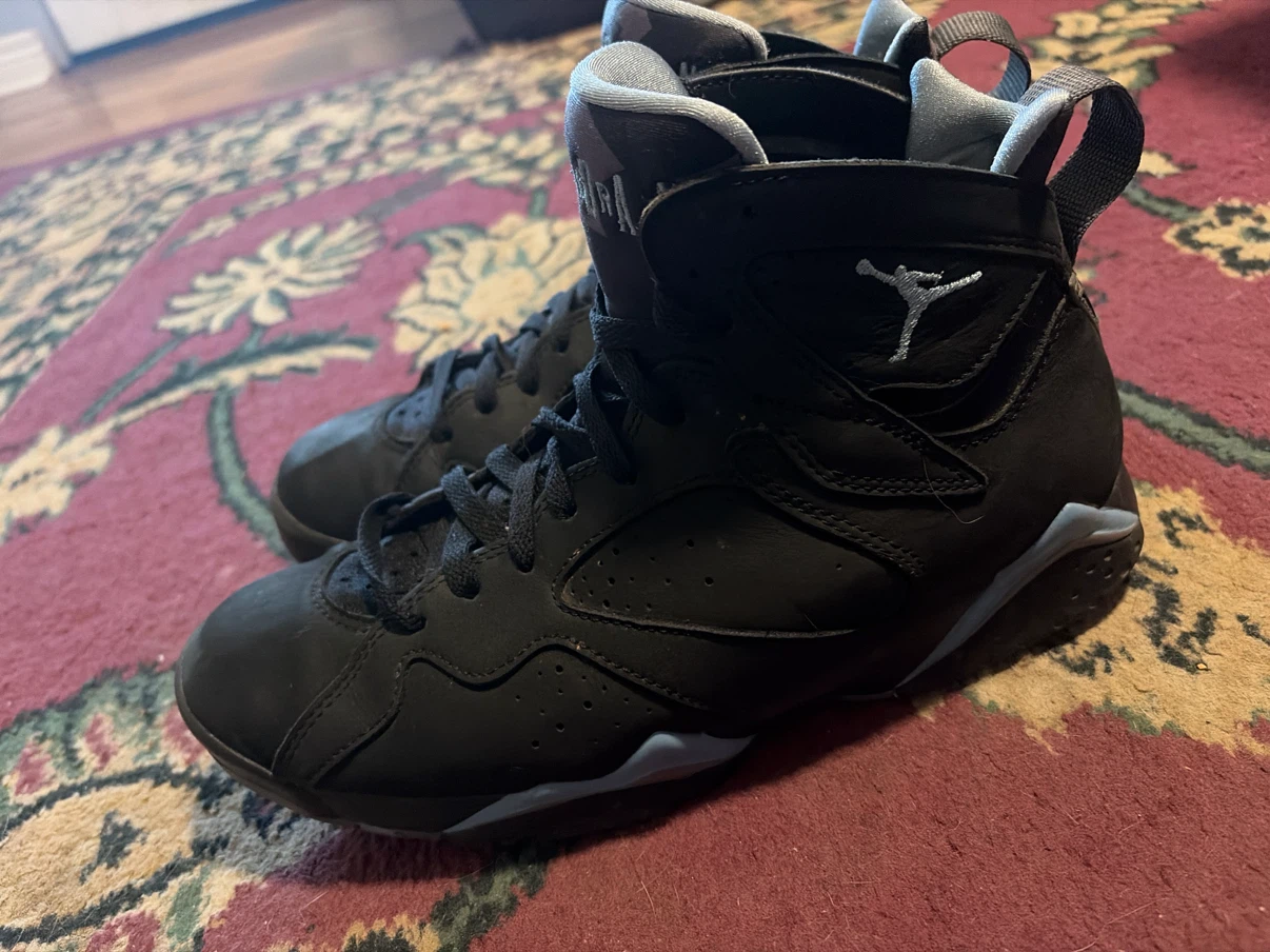 Jordan 7 Retro Black and Blue Sneakers - photo 4