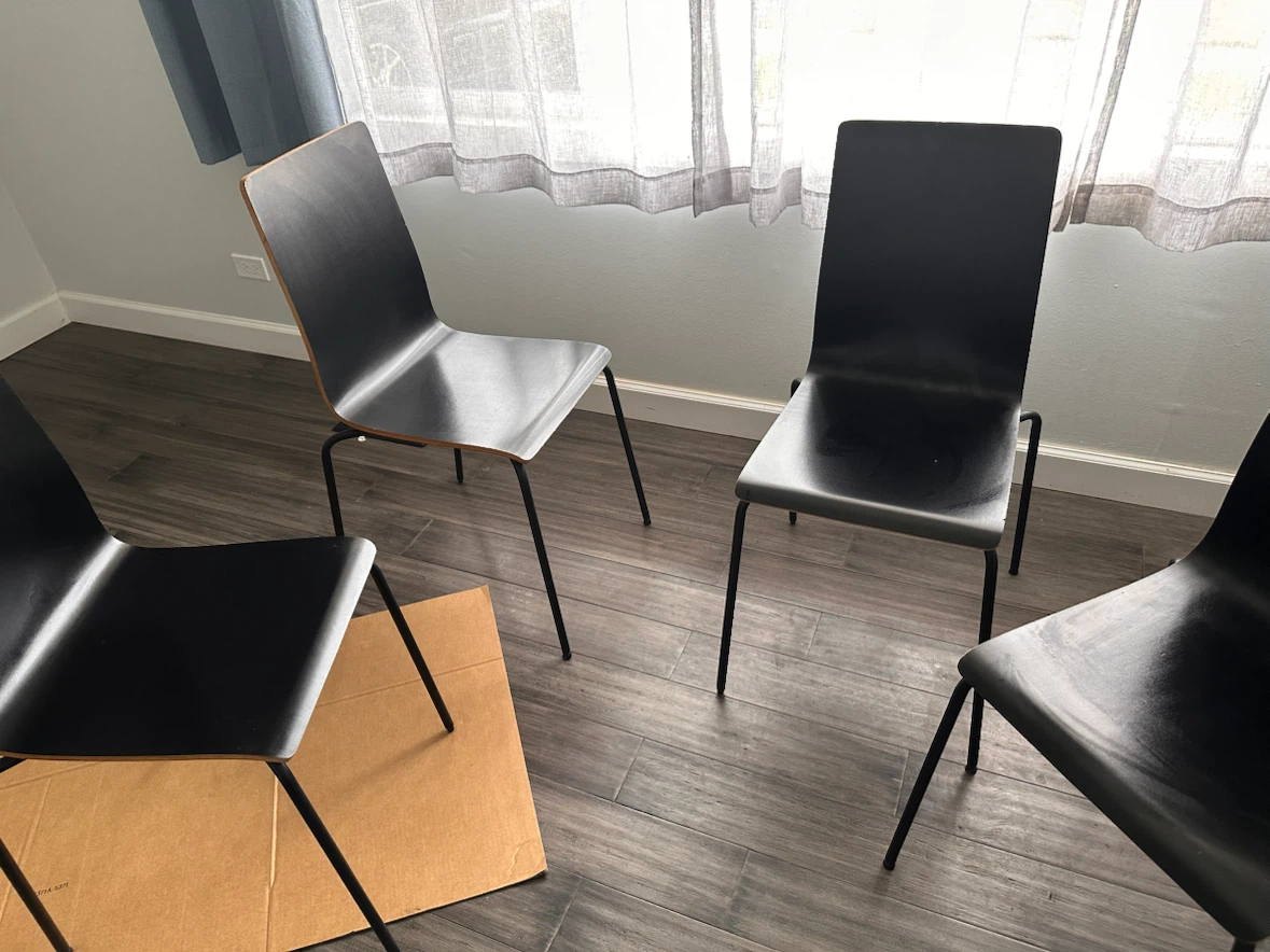Set of 4 black dining chairs