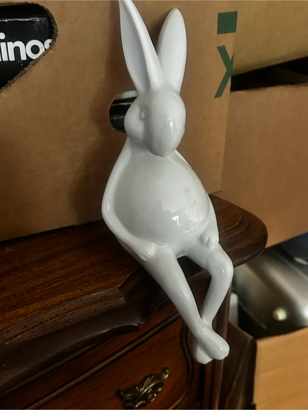 Ceramic shelf sitting rabbit