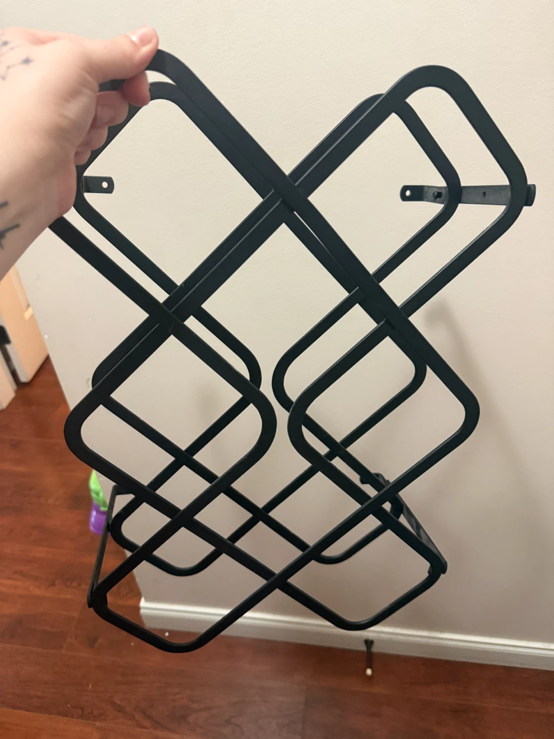 Black Metal Wall-Mounted Wine Rack